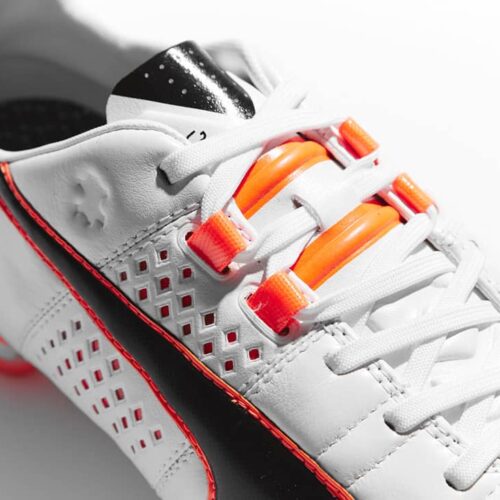 Image de l'article Puma dévoile une King Blanc/Orange/Noir