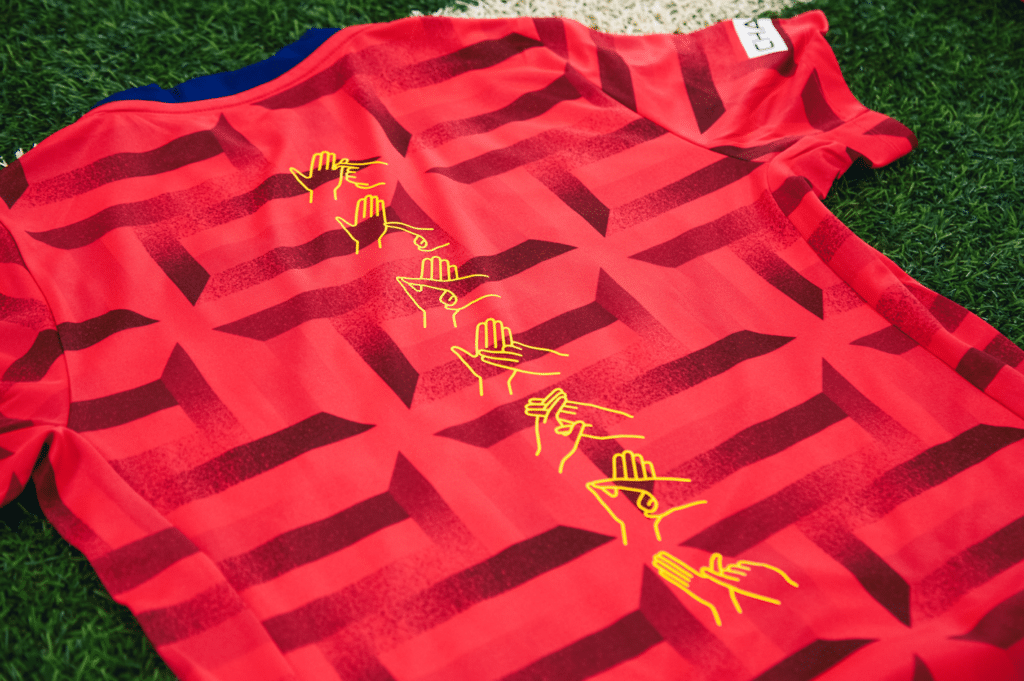 maillot pre match angleterre langue des signes