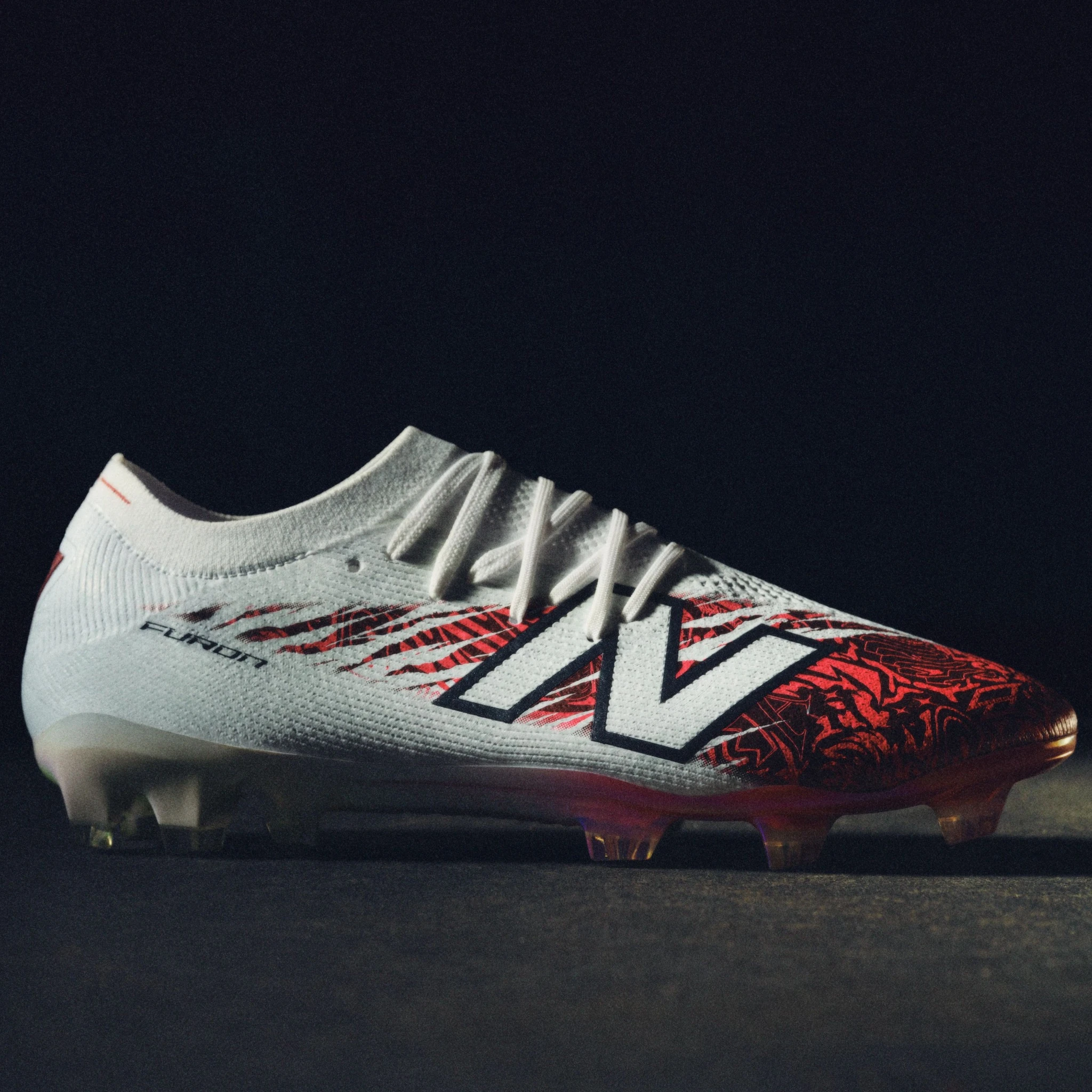 crampon bukayo saka new balance furon